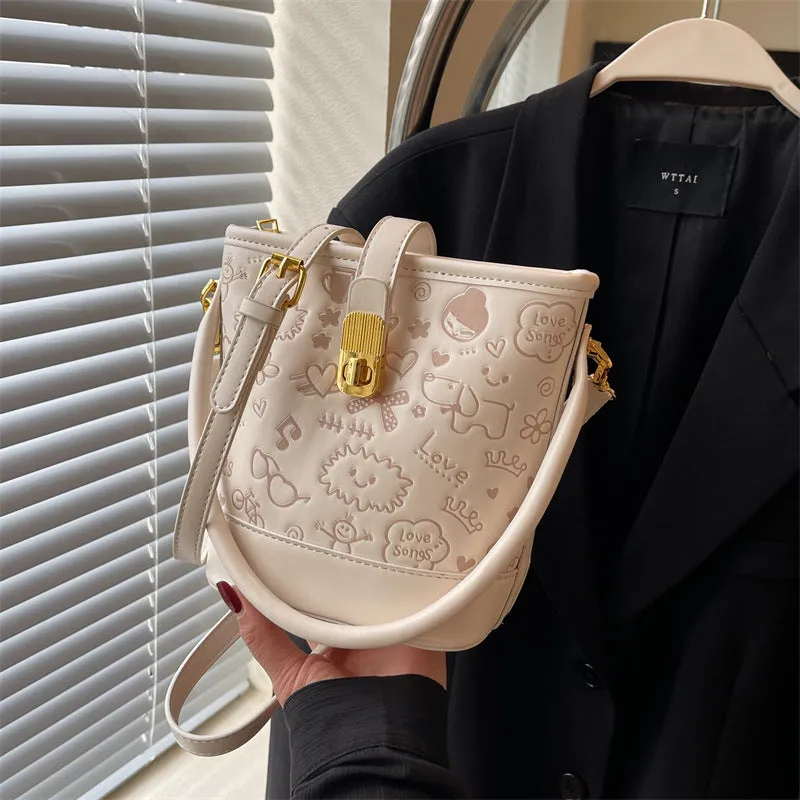 REALAIOT 2025 Cute texture single shoulder printed bag women's popular new trendy fashion solid color versatile single shoulder versatile bucket bag