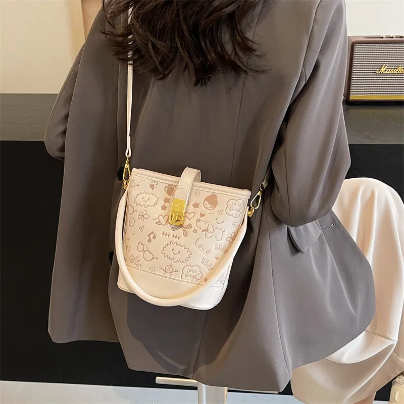 REALAIOT 2025 Cute texture single shoulder printed bag women's popular new trendy fashion solid color versatile single shoulder versatile bucket bag
